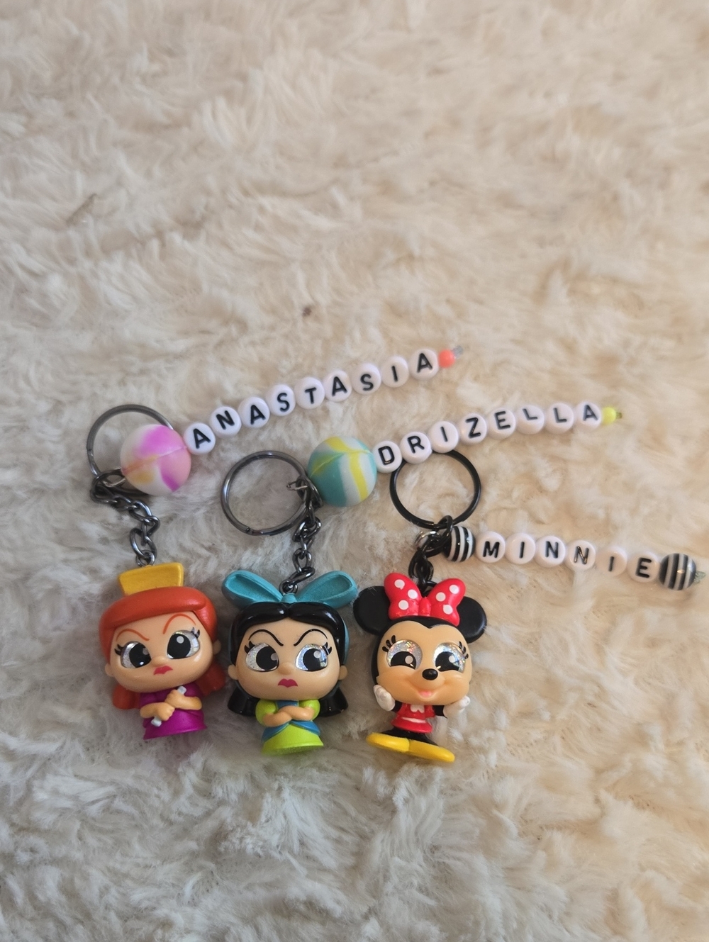 Disney Mini Figurine Keychain Set - Red, Pink, Blue, Yellow, Green, Black